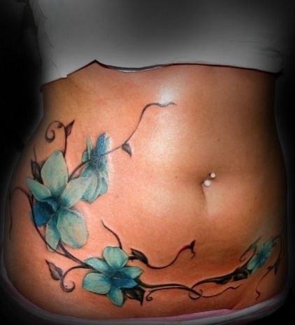 tatouage liane ventre