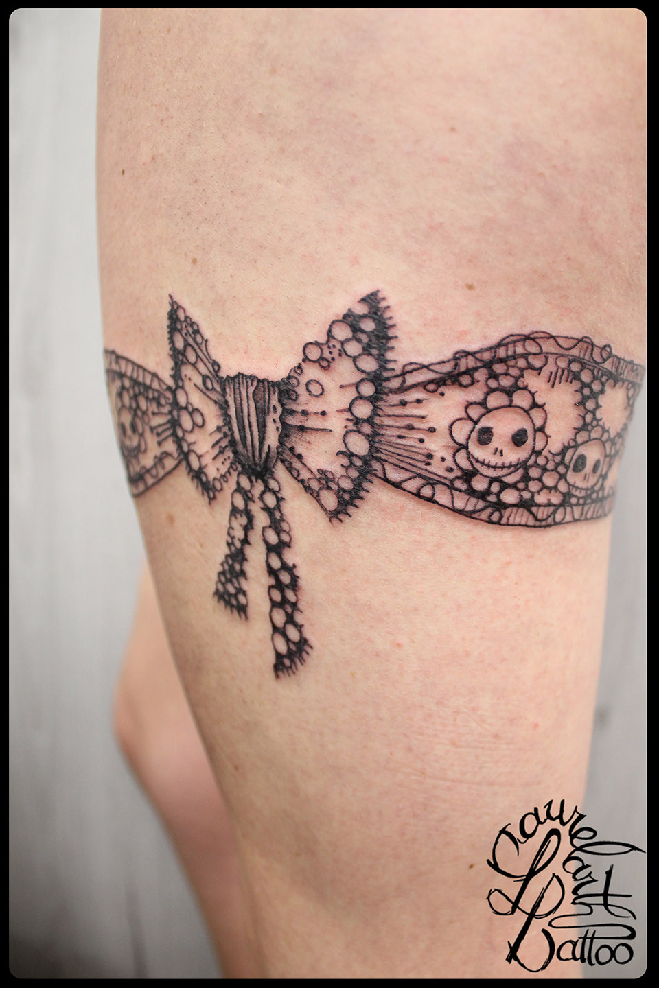 tatouage noeud avec tête de mort