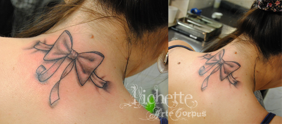 tatouage noeud nuque femme