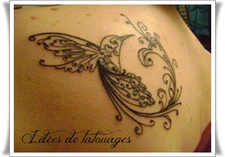 tatouage oiseau arabesque
