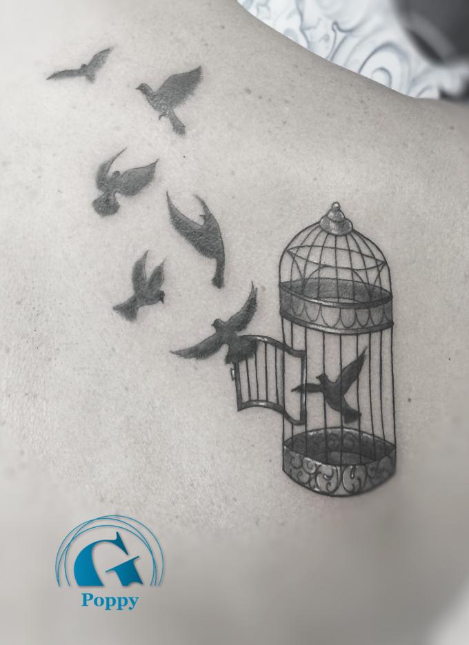 tatouage oiseau cage