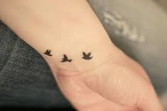 tatouage oiseau coeur