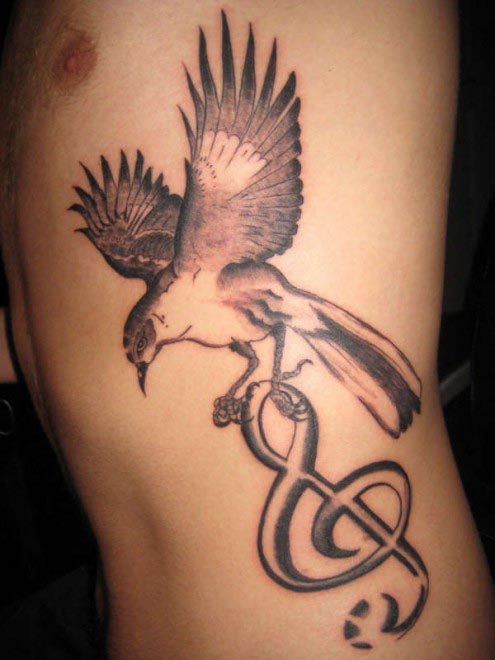 tatouage oiseau musique