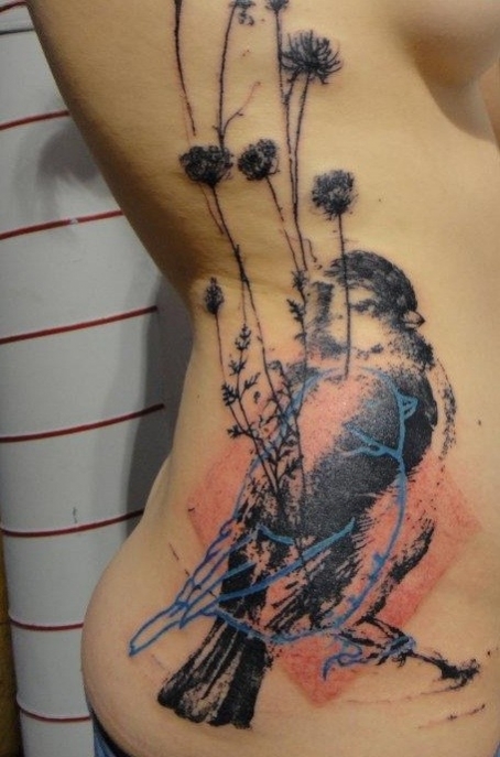 tatouage oiseau stylisé