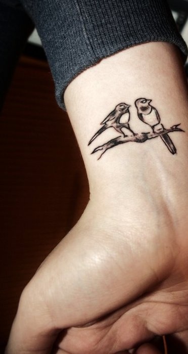 tatouage oiseau sur branche