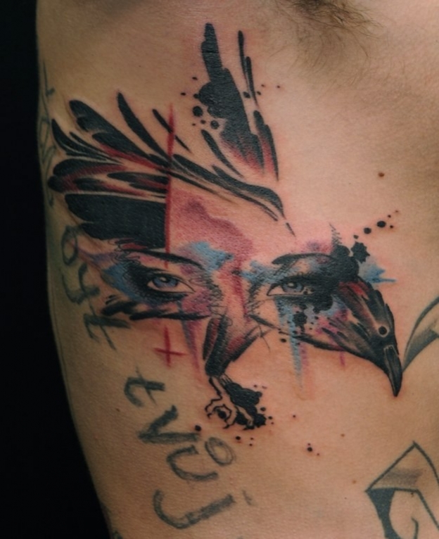 tatouage oiseau visage