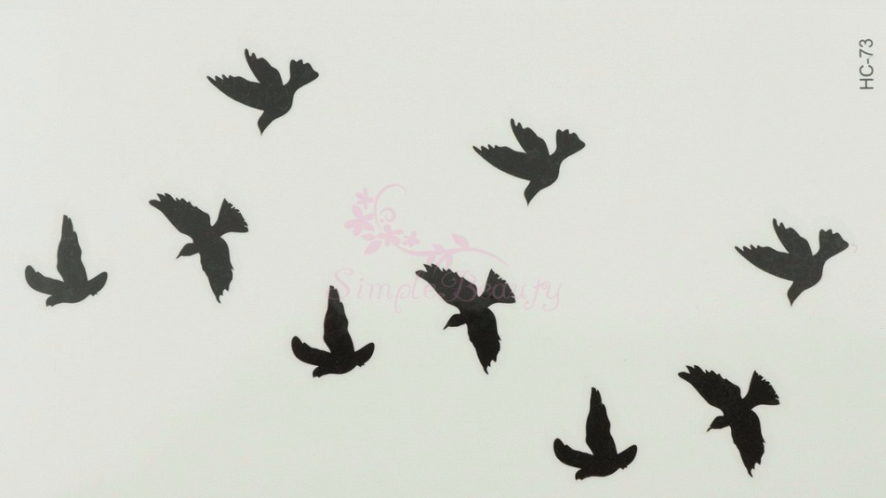 tatouage petit oiseau noir