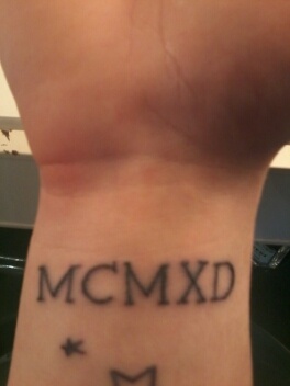 tatouage romain omoplate