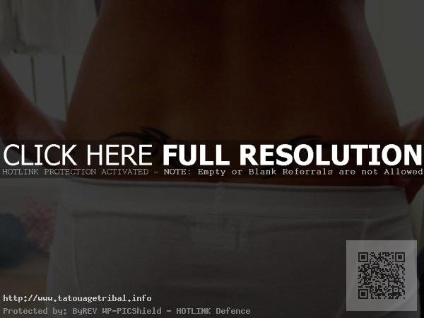 tatouage tribal bas du dos homme