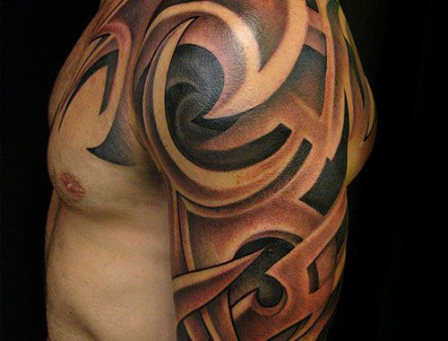 tatouage tribal bras épaule homme