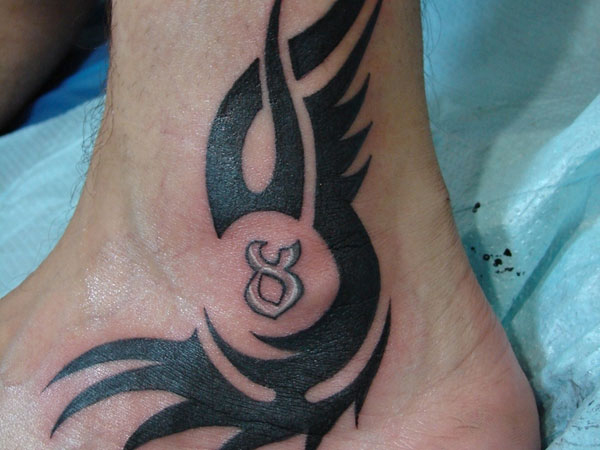 tatouage tribal cheville pied homme