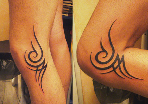 Tatouage tribal genoux