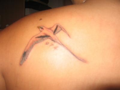 tatouage tribal paille en queue