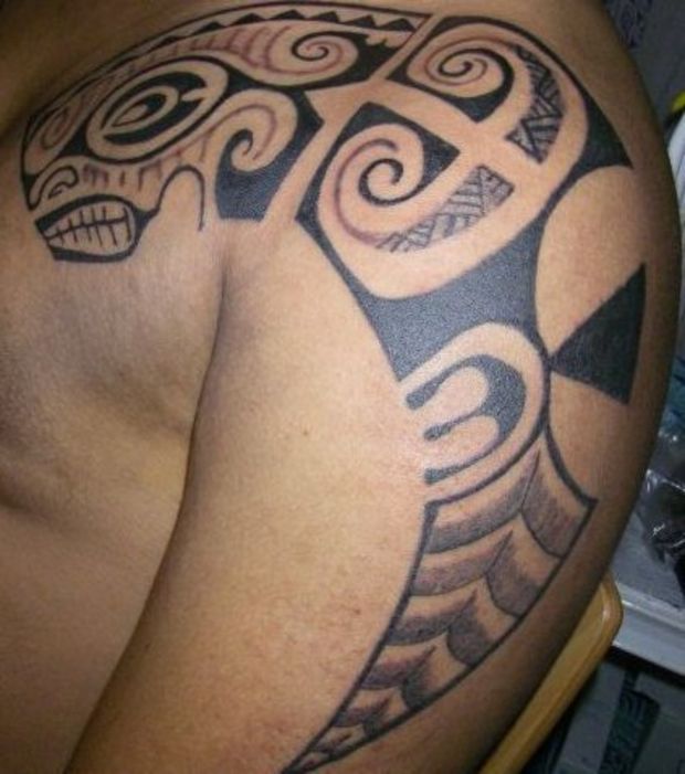 tatouage tribal sur le bras