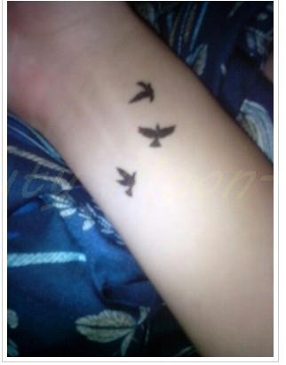tatouage trois oiseaux