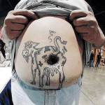 tatouage vache ventre