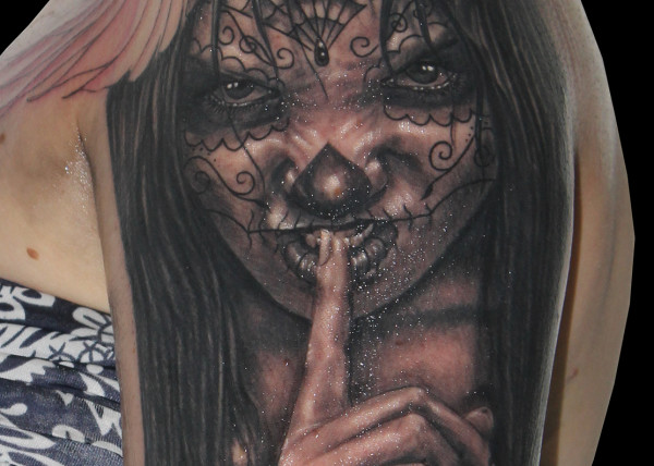 tatouage visage ange et démon